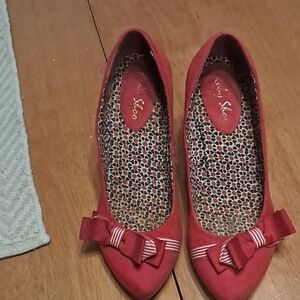 Elegant Red Heels with Bow Accent